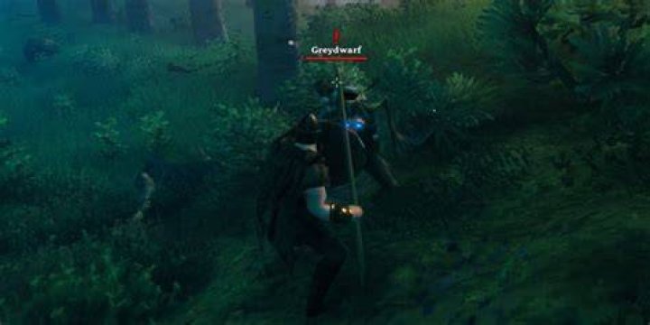 A Viking blocks a Greydwarf attack in combat in Valheim