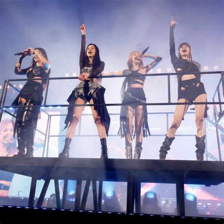 BLACKPINK performing at the Coachella Stage (L). The music band attends the 2022 MTV VMAs (R) BLACKPINK performing at the Coachella Stage (L). The music band attends the 2022 MTV VMAs (R)