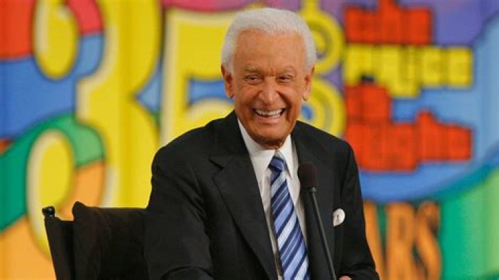 Bob Barker, smiling with arms wide open, on The Price Is Right