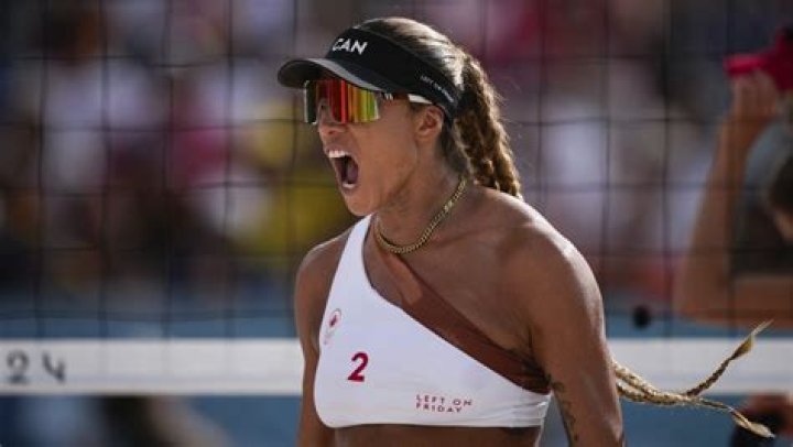 Brandie Wilkerson celebrates during the Women's Preliminary - Pool C beach volleyball Brandie Wilkerson celebrates during the Women's Preliminary - Pool C beach volleyball