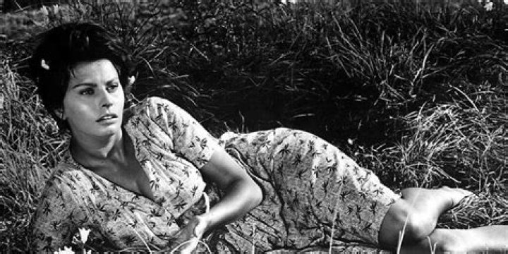 Cesira lays in grass in Two Women