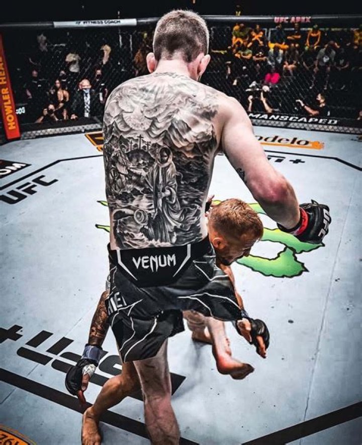 Cory Sandhagen's Mesmerizing Back Tattoo: A Deep Dive