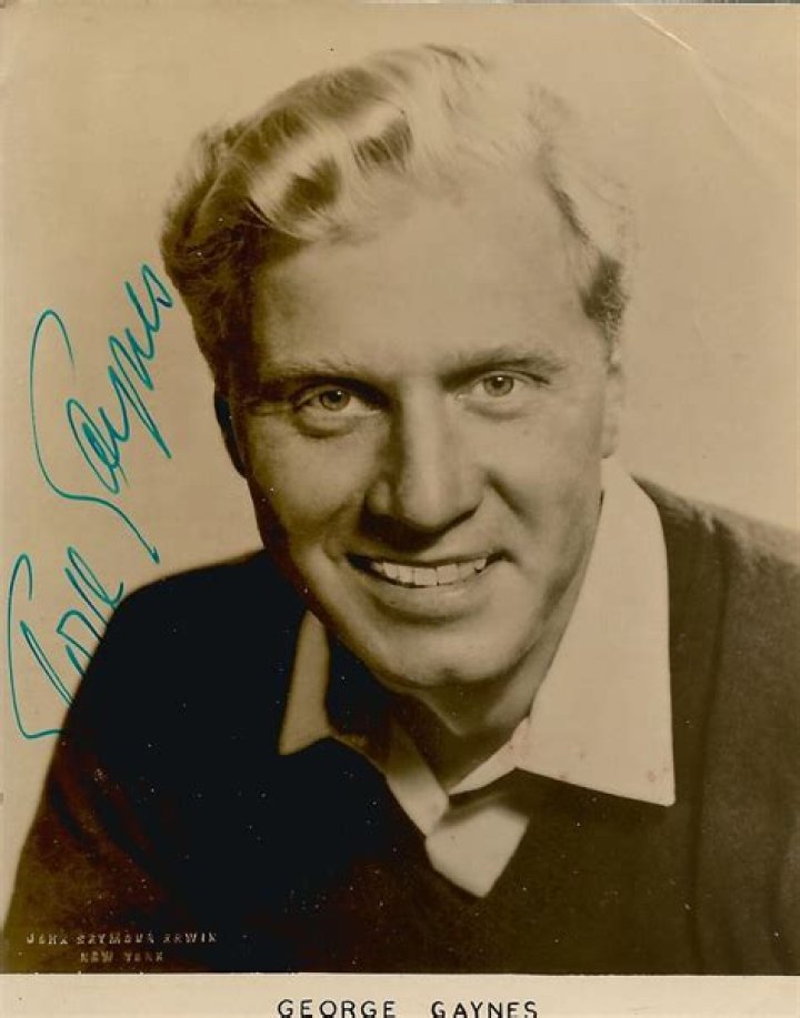 George Gaynes holds some water in a glass (L). Actor George Gaynes and Allyn Ann McLerie at Spago Restaurant in California