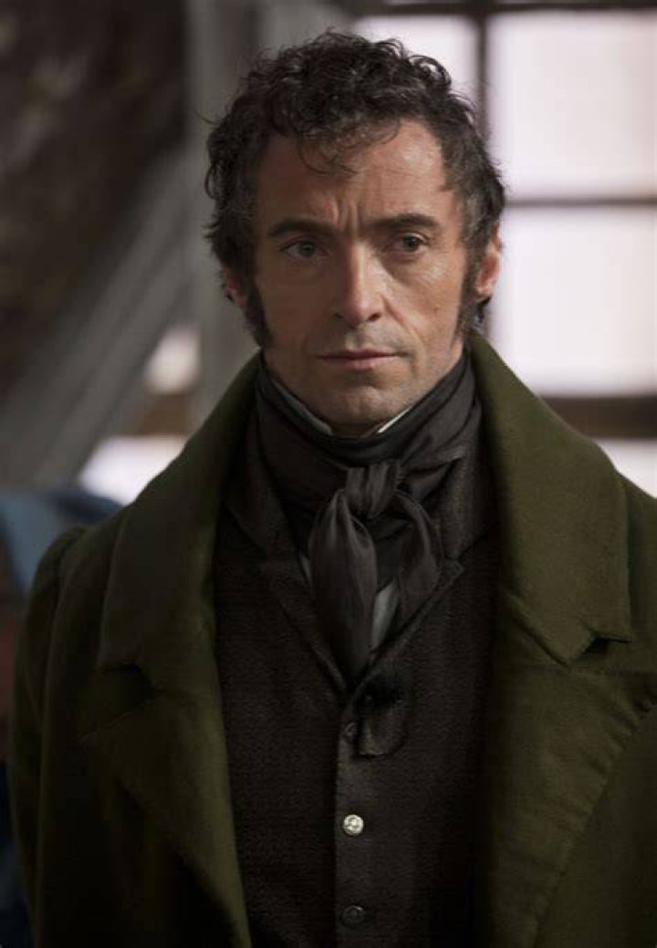 Hugh Jackman as Jean Valjean looking serious in Les Miserables