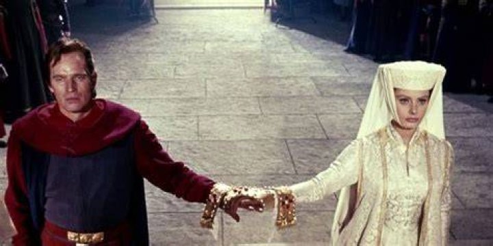 Jimena holds El Cid's hand in El Cid