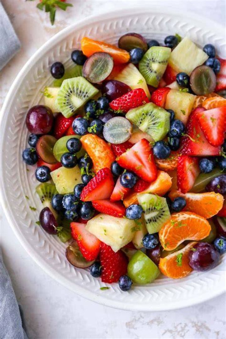 Kiwi, grapes, strawberries, and apples