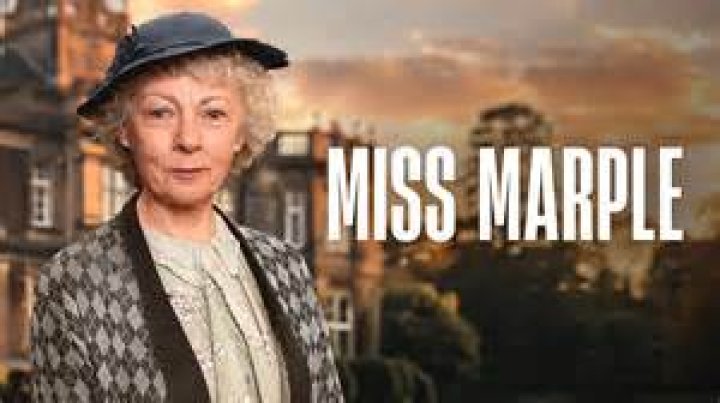 Miss Marple talks with a woman in the kitchen in Murder She Said.