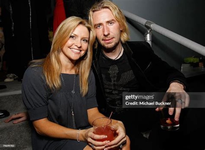 Singer Chad Kroeger and wife Marianne Gurick attend the Warner Music