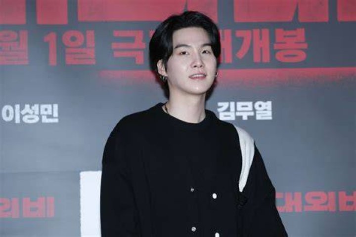 Suga of boy band BTS attending The Devil's Deal VIP Screening