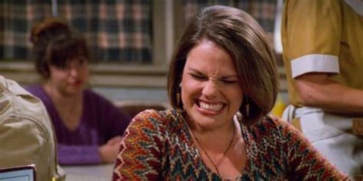 Suzanne Cryer as Marcy making a scrunched up face in Seinfeld