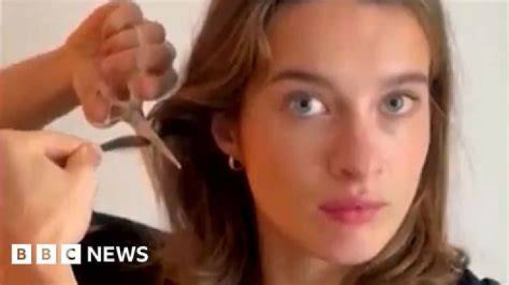 TikTok video of woman cutting ball