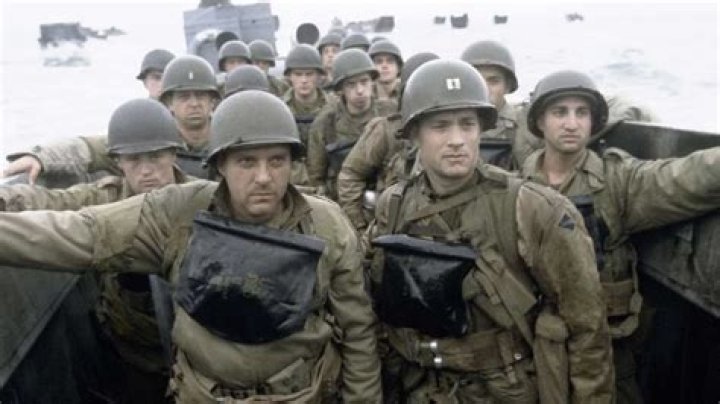 Tom Hanks as John H. Miller and Dennis Farina as Walter Anderson in Saving Private Ryan